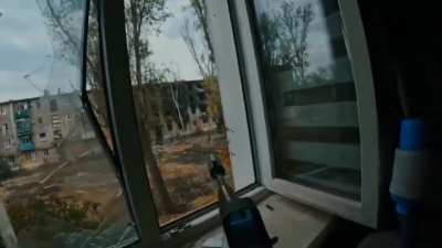 Ukrainian soldier is firing towards a Russian position, then a grenade launcher shell hits it. The city of Toretsk, Donetsk region. &quot;Enei&quot;, OSHBr &quot;LYUT&quot;, 48.395219,37.848893