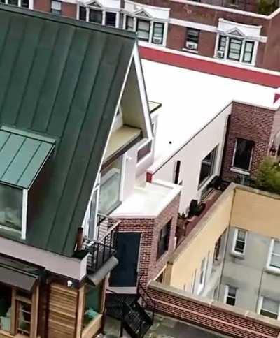 A house built on top of another building in NYC.