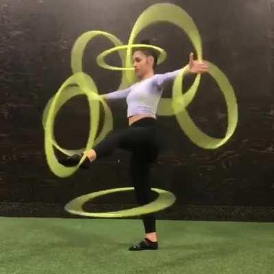 This woman hula hoops