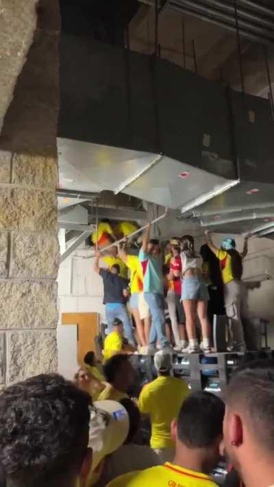 Fans without tickets forcing their way into the Hard rock stadium to watch the Copa America final