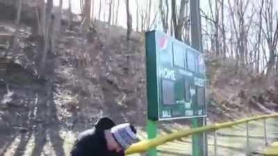 Kid crushes his nuts by backflipping onto a fence