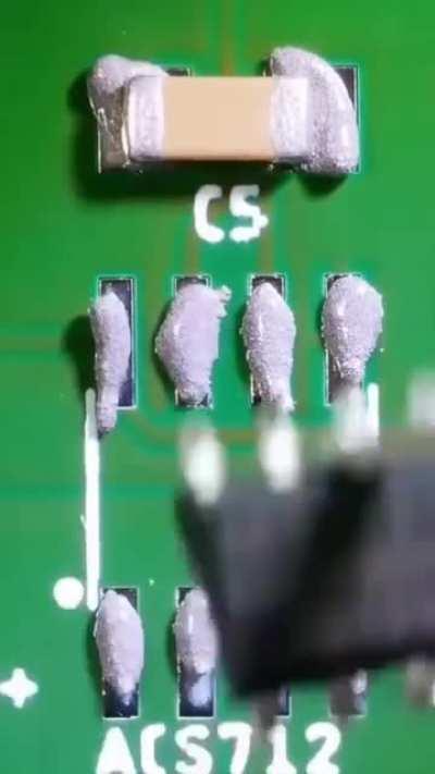 Melting soldering paste on SM components.