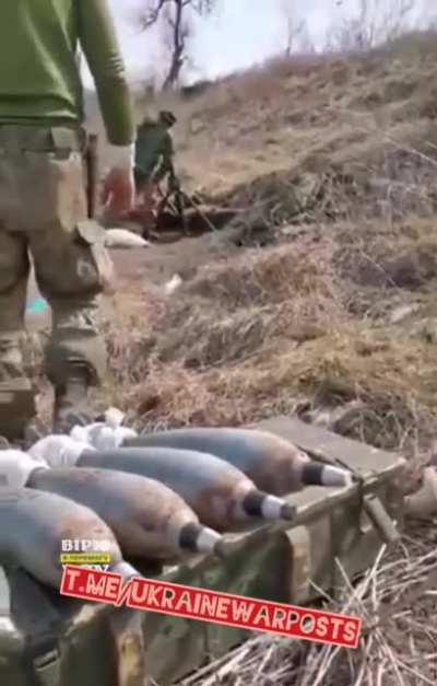 Mortar men of the Armed Forces of Ukraine working over a Russian position in Eastern Ukraine.