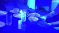 Experiment to demonstrate how germs spread using fluorescent paint