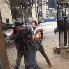 Guard gets assaulted in Chicago, pulls out weapon