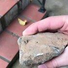 Cracking open an obsidian rock.