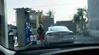 Poor blonde woman tries to fill up a Model S with gas and the guys can't keep it in