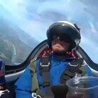 Pouring a can of red bull whilst upside down in a jet