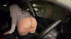 Twerking her bare ass in a car