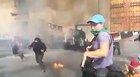 Feminist throws a Molotov cocktail to all-female riot police in a Women's Day March in Mexico City. WCGW