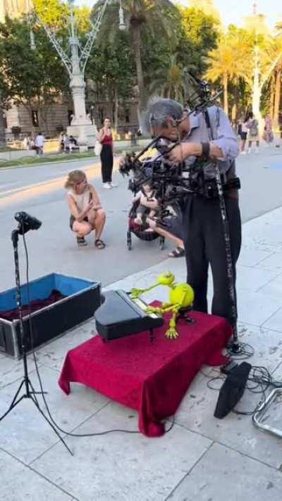 A true puppet master. The name of the artist is Daniel on the streets of La Rambla in Barcelona, Spain.