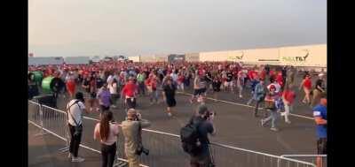 Crowd rushes into venue at a chance to see President Trump in front row at his Nevada rally.