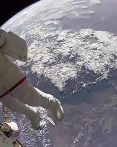 Astronauts on a space walk.