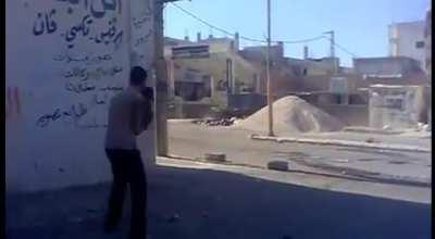 FSA plainclothes fighter ambushes a Syrian Army tank in Daraa - October 2012