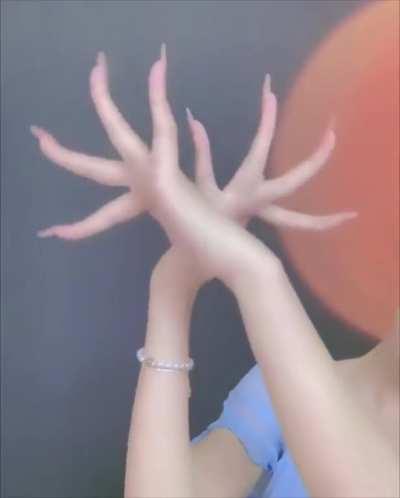 This woman’s hand dancing.