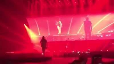 Travis Scott falls through stage at concert