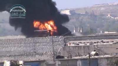 Opposition &quot;Hell Cannon&quot; strike manages to hit an SAA controlled fuel tank of some kind - Ramouseh, Aleppo - 4/12/2014