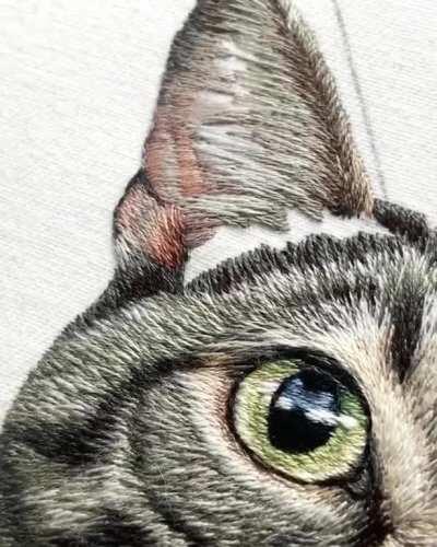 This tabby cat embroidery took 50+ hours and thousands of tiny stitches