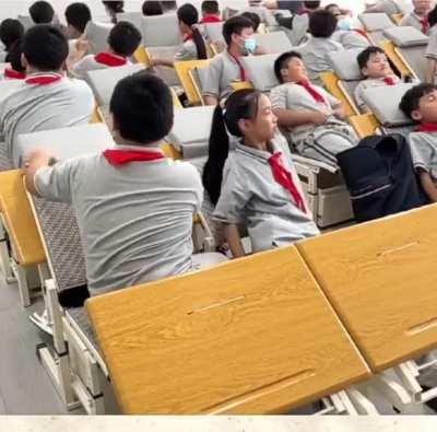 School desks can adapt into inclined beds during naptime