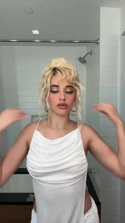 Camila wearing white dress | TikTok 7/4/24