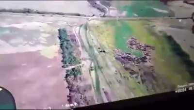 Drone footage provided by the Ukrainian 72nd Mechanized Brigade shows a Russian IFV trying to push through Ukrainian defenses, while it is getting attacked by artillery. After it is getting stopped the soldiers the vehicle was transporting are trying to e