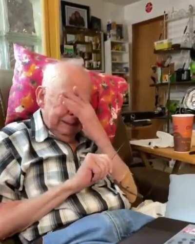 Old man sees animated photo of his deceased wife.