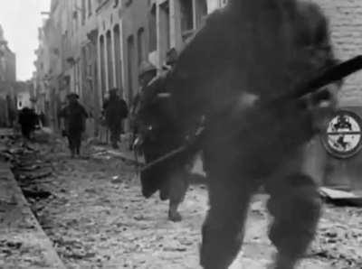 [World War II] British infantry and tanks probably of the 6th Guards Tank Brigade in action likely enroute to Münster, Germany in late March 1945.