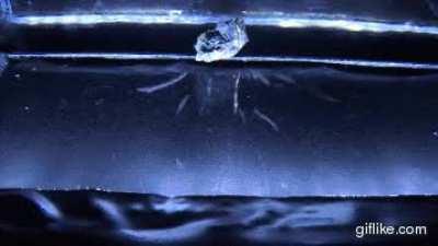 Radioactive emissions from Uranium that are visible to the naked eye in a cloud chamber