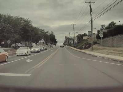 Camry driver gives fully extended, vigorous thumbs down