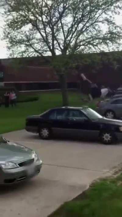 Flipping in front of parked cars