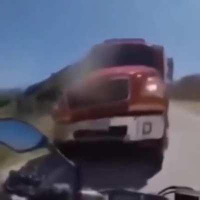 A motorcyclist on a hill?