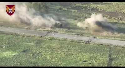 Ukrainian paratroopers of the 46th Airborne Brigade destroy a Russian Turtle Tank with an ATGM and the help of a D-30 howitzer