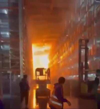 St. Petersburg, a warehouse with an area of ​​more than 75,000 square meters is on fire. View of the raging inferno from inside the warehouse.