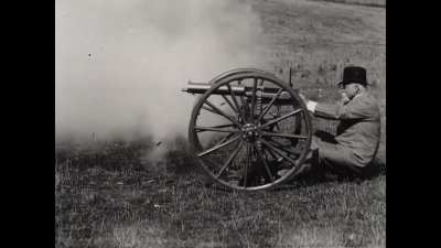 Sir Hiram Maxim firing his field gun (1897)