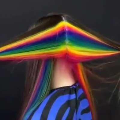 This rainbow coloured hair hidden under her natural hair