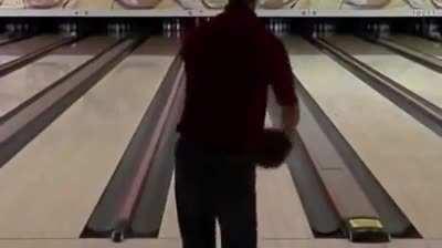 An unreal spare in a bowling alley