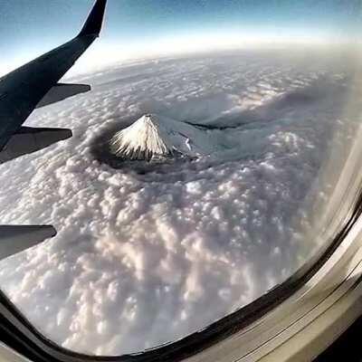 Mount Fuji splitting clouds