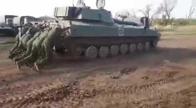 Only in Russian Army: Push starting of the 2S1 Gvozdika self-propelled howitzer.