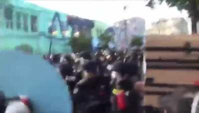 SHARE THIS! THE MOMENT SEATTLE POLICE INSTIGATE A RIOT OVER A PINK UMBRELLA (SERIOUSLY). PROTEST WAS 100% PEACEFUL BEFORE. POLICE ARE ALREADY LYING ABOUT WHAT HAPPENED.