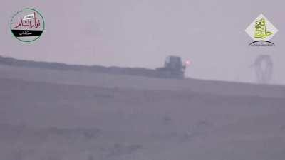 Opposition BGM-71 TOW team targets an SAA bull-dozer near al-Wadhihi, Aleppo - 10/21/2015