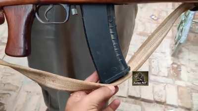 Pakistan Lee-Enfield conversion to 5.45, taking AK-74 mags.