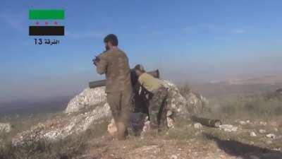 13th Division BGM-71 TOW team engages a pair of Syrian Army tanks, one instant cook off - Museibin Checkpoint - 2015