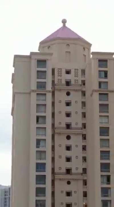 Kid walks around her building three times for a &quot;dare challenge&quot;.