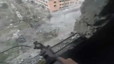 Ukrainian soldier shooting out the window at Russian infantry storming his building in Vuhledar, Donetsk region. 72nd Mechanized Brigade [Sept 2024]