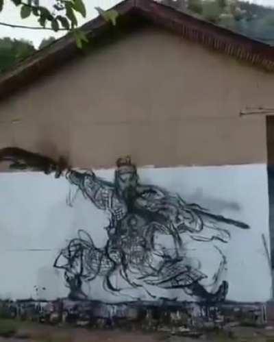 Painting using a burning charcoal