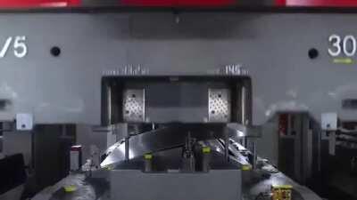 Tesla manufacturing model Y body panels in Fremont, California. Stamping, while constrained by constant-thickness sheet design, is very fast, efficient, and economical at high-volumes.