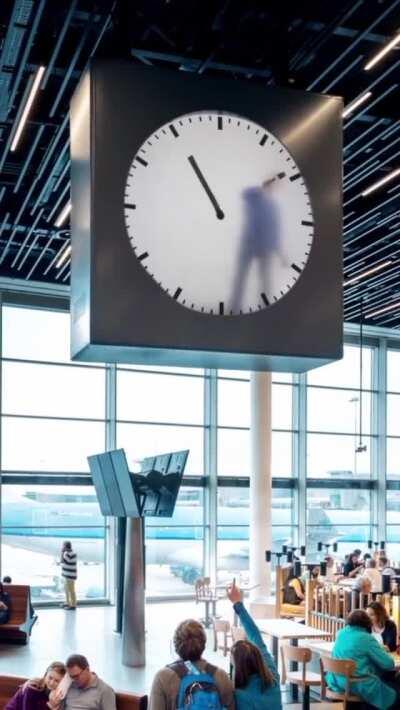 The clock at the Schiphol Airport in Amsterdam looks like it has a worker in it. Maarten Baas who created this art instalation actually filmed himself painting every minute on the clock for 12 hours.