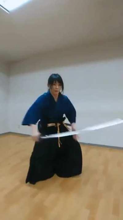 Demonstrating different ways to draw a katana