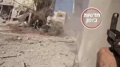 Footage of a Hameas militant firing an RPG at an Israeli tank, today (13/11/2023) in Gaza  (intercepted by APS?) 