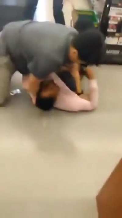 Shop owner and wife put alleged shoplifter in a choke hold.